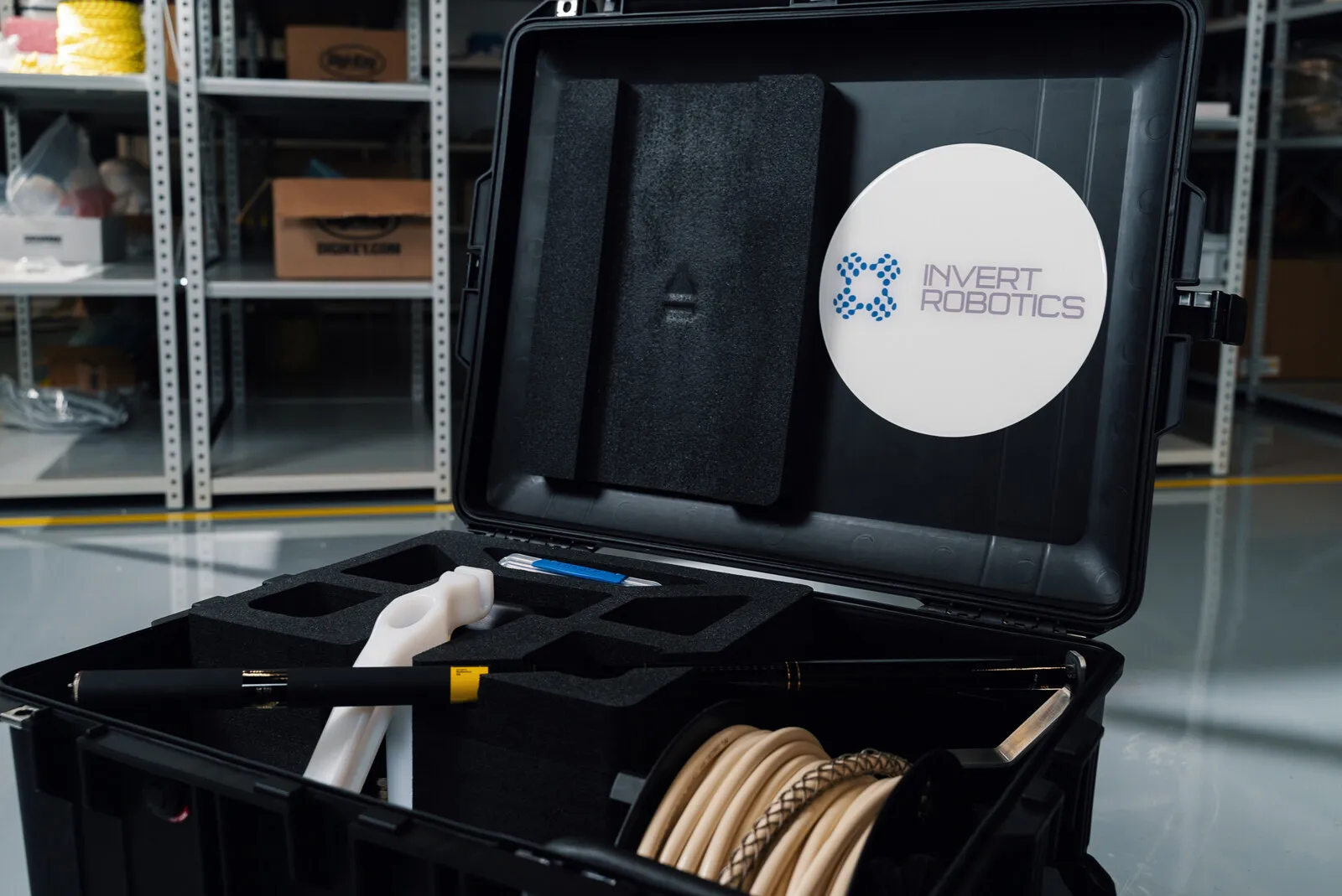 The flightcase open in the hall, the system packed inside