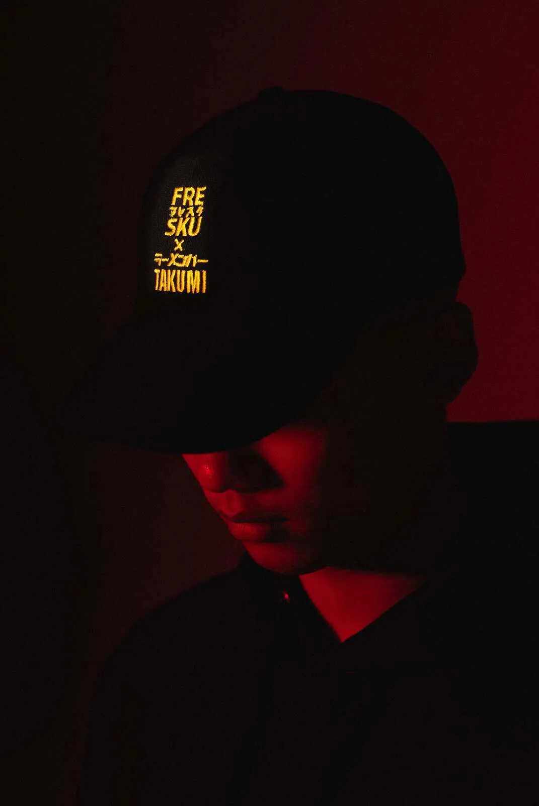 The six-panel Fresku x Takumi cap, embroidered at the front