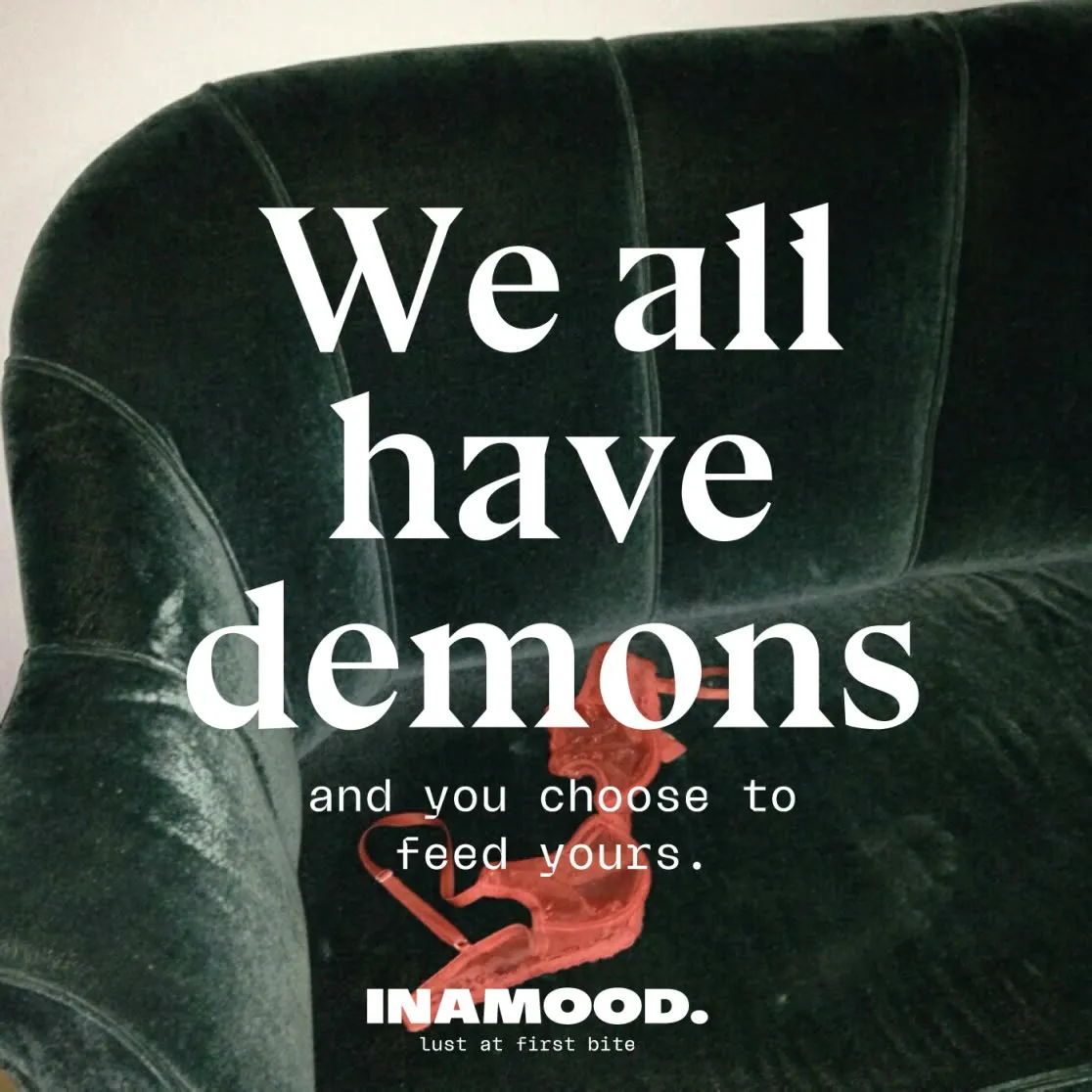 Campaign image: 'We all have demons and you choose to feed yours' over a green velvet sofa