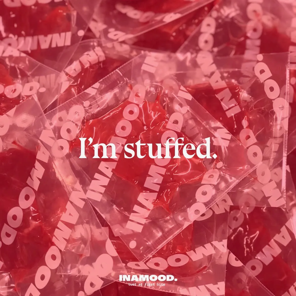Campaign image: 'I'm stuffed.' over a pile of branded vacuum packs