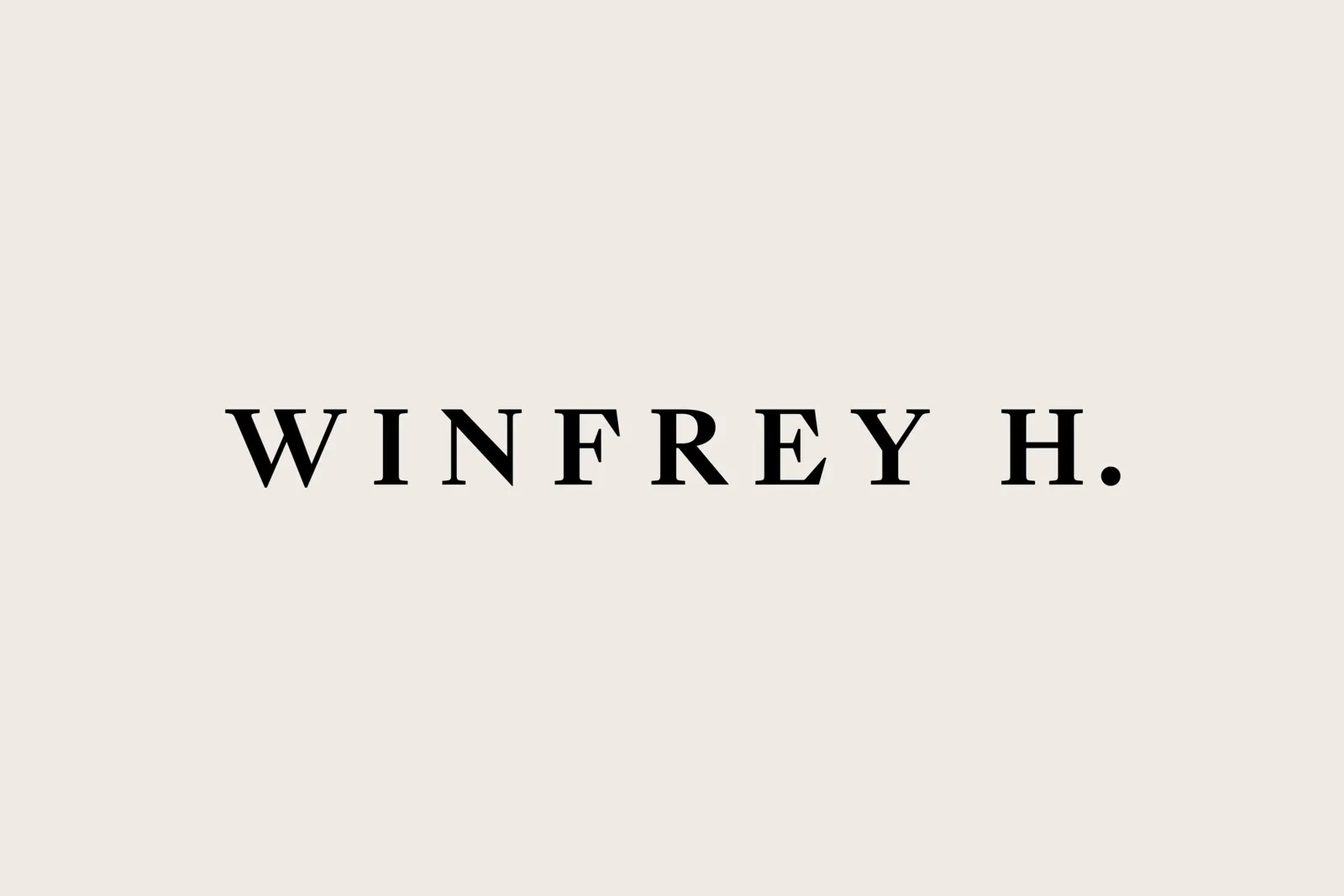 The Winfrey H. wordmark, a letterspaced high-contrast serif on warm stone